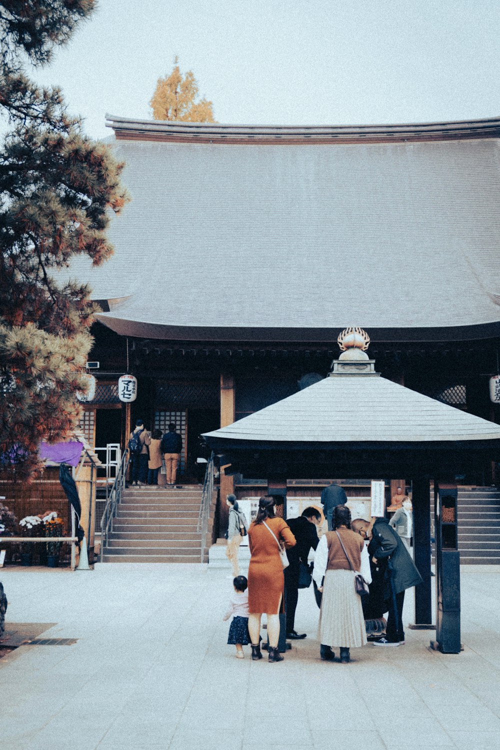 a group of people outside a building