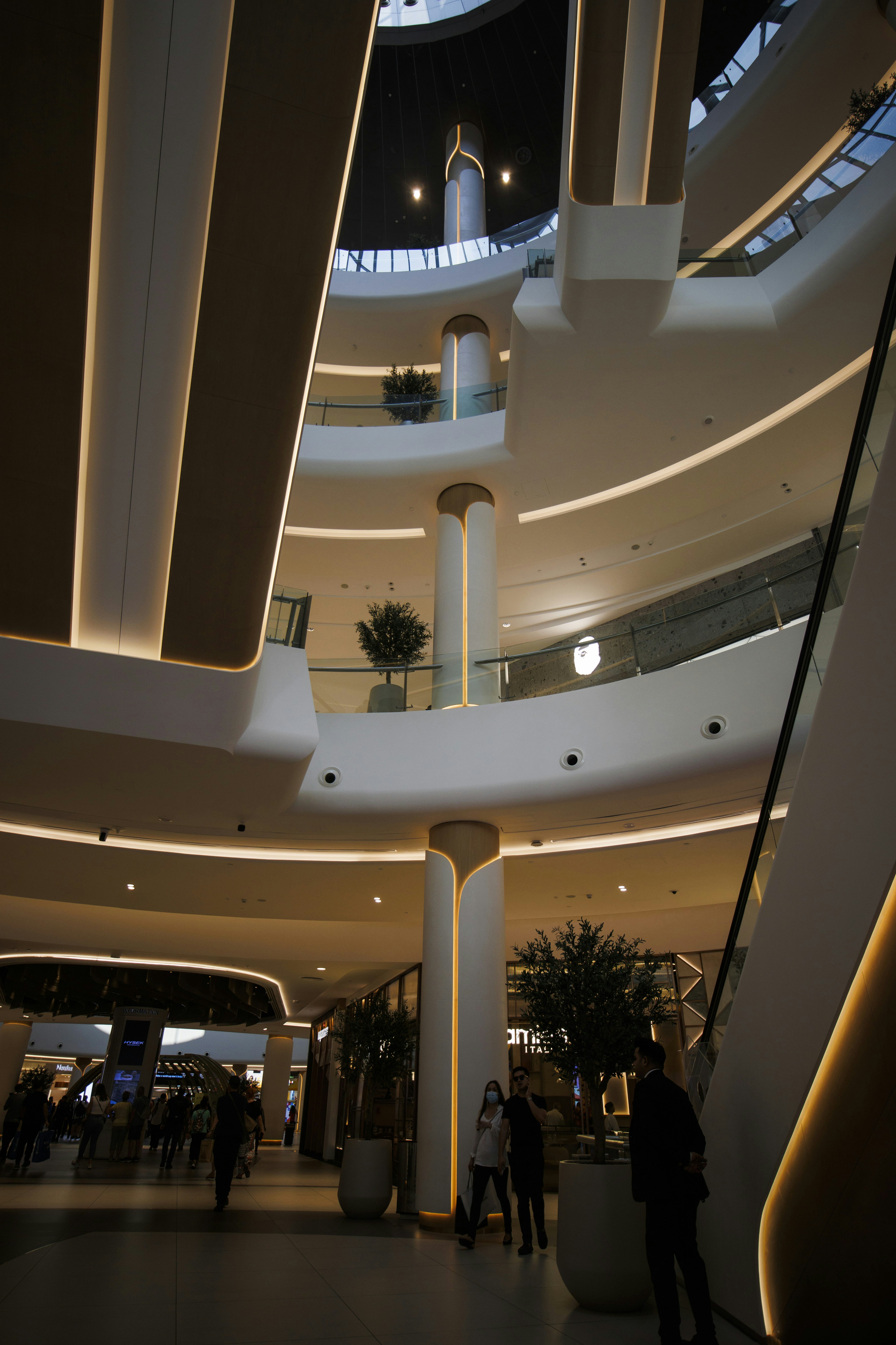 a group of people walking in a building