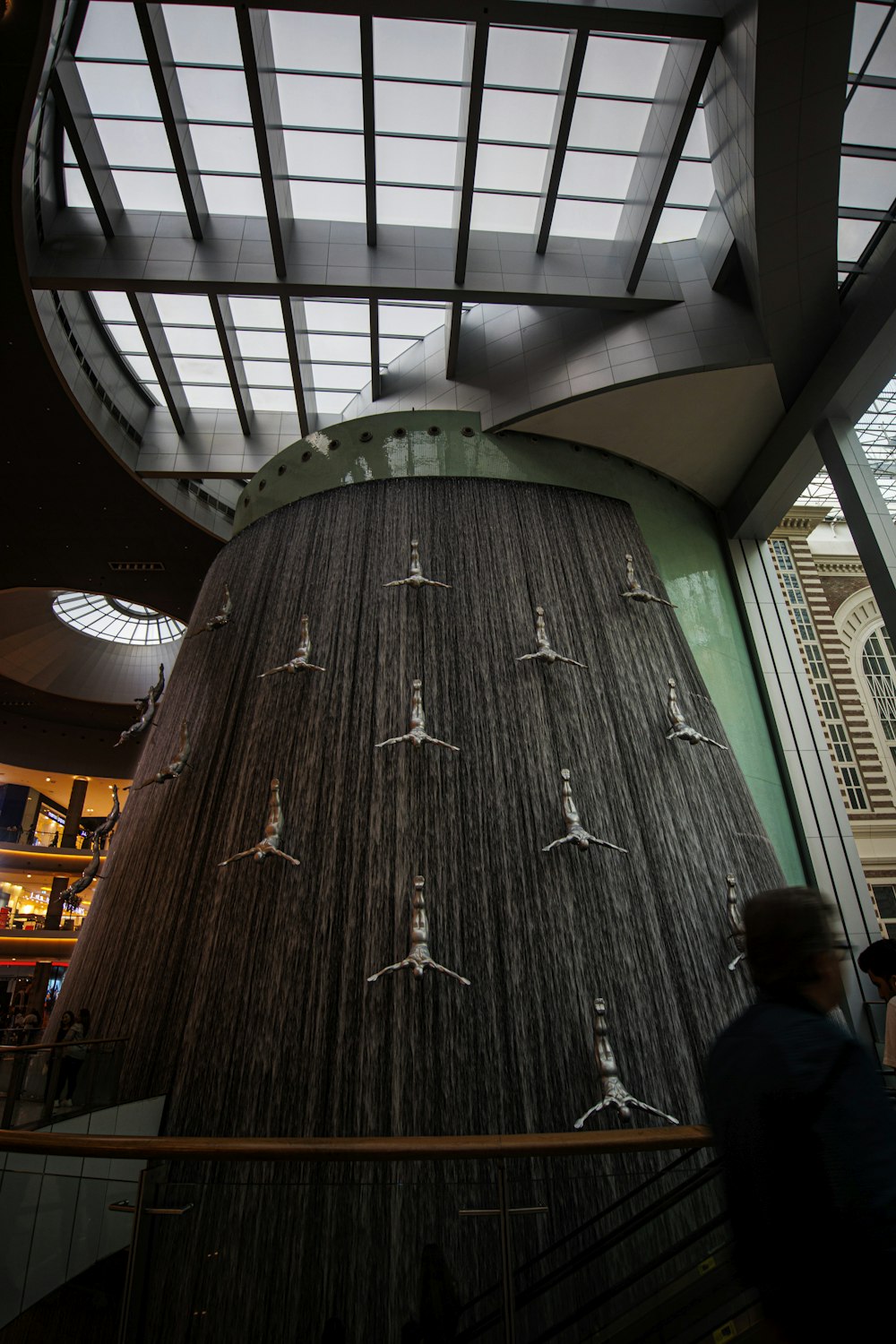 a large wooden structure with a large metal object on top