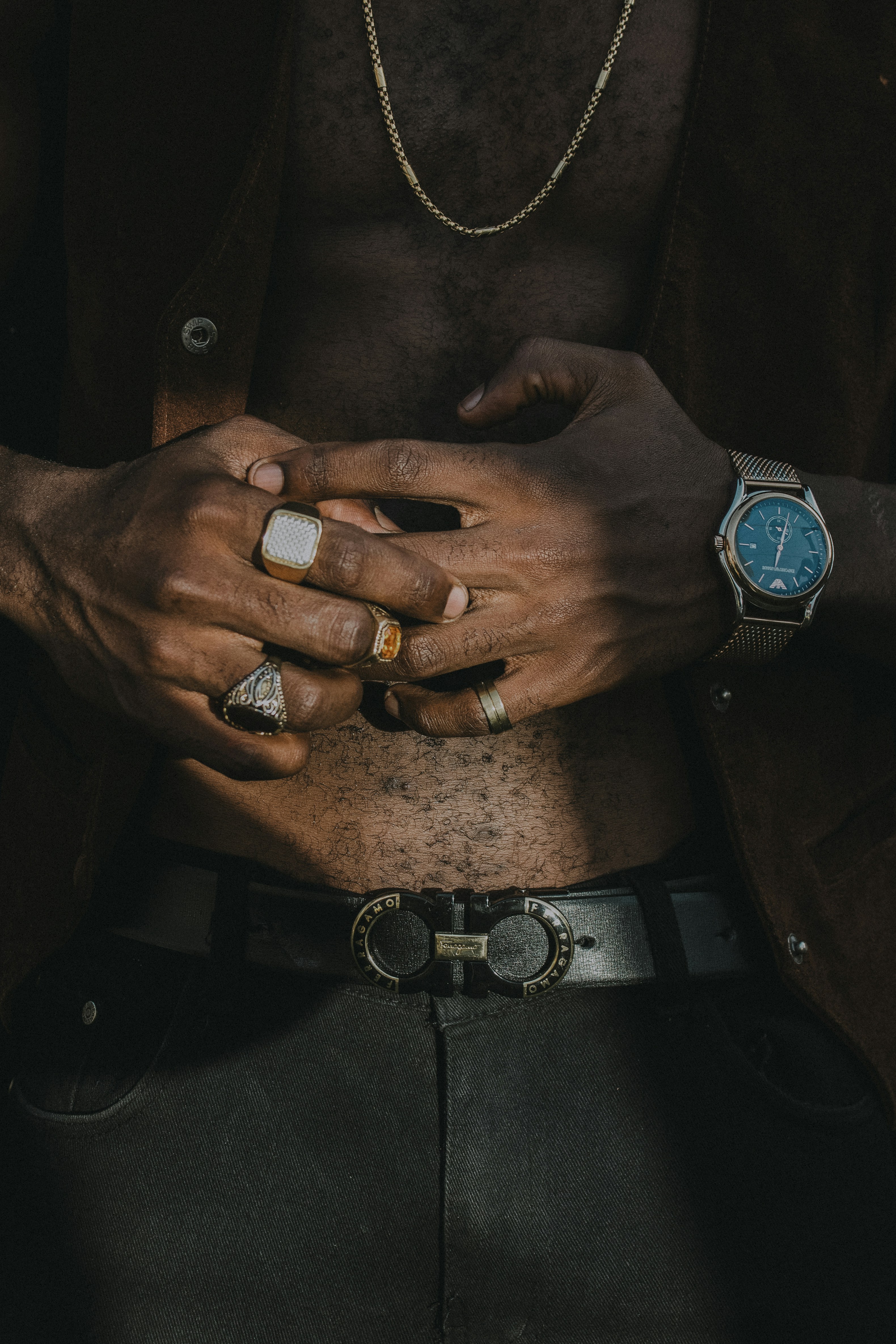 a man holding his hands together