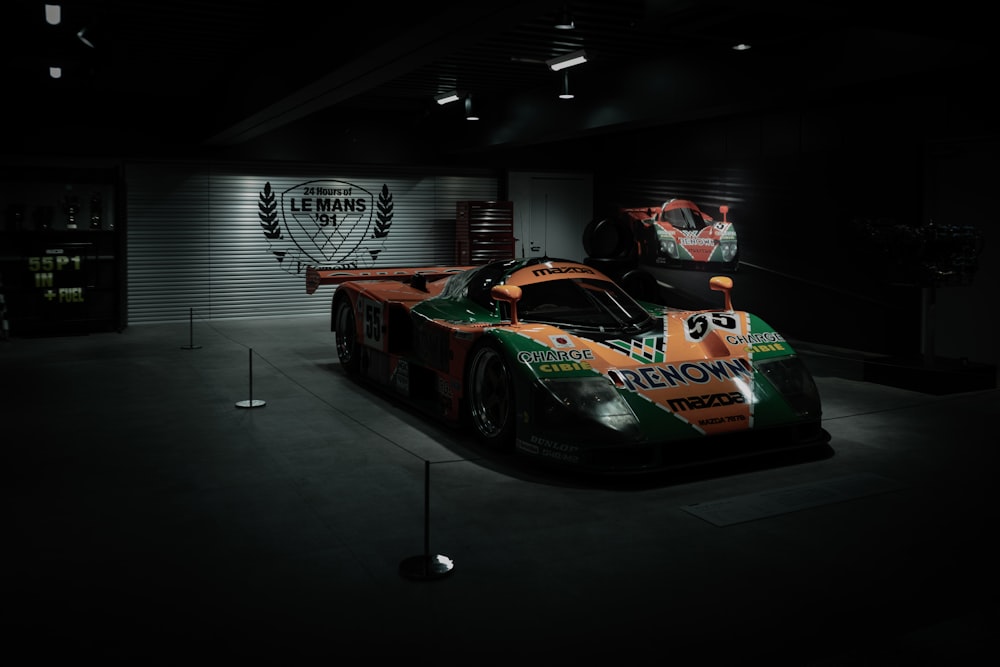 a race car parked in a garage
