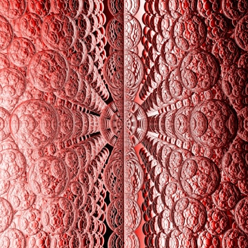 A complex fractal pattern featuring an array of intricately textured circular shapes, creating a symmetrical design. The pattern creates a sense of depth and perspective, with the circles appearing to extend infinitely inward.