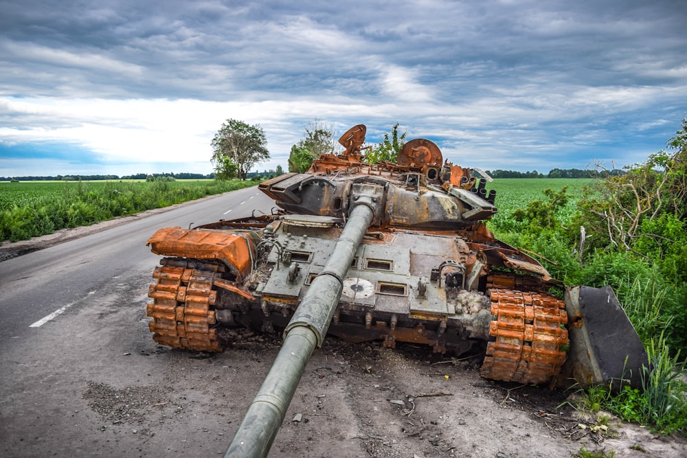 a large tank on the side of a road