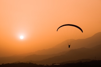a person parachuting in the air