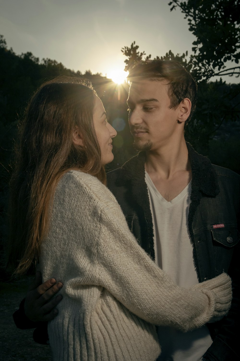 a man and woman kissing