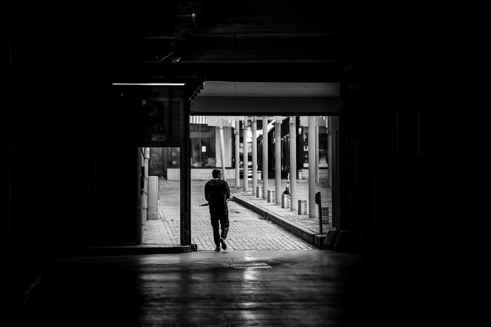 a person walking in a hallway