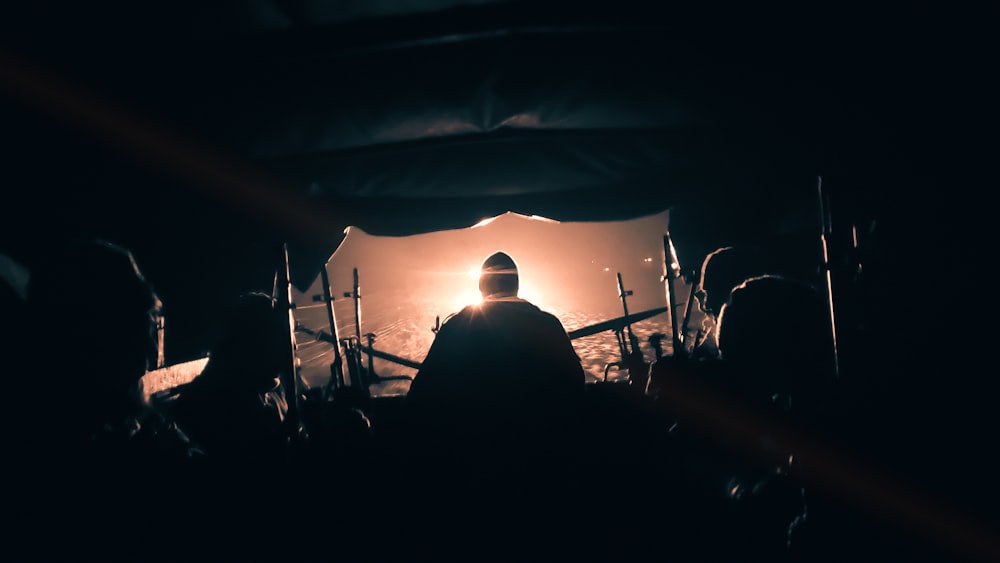 a person playing a guitar on a stage