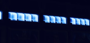 a blue sign with white text