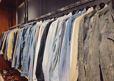Work jackets arranged neatly on industrial racks highlighting durability and design