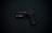 A black handgun with detailing and an attached flashlight is displayed against a dark background.