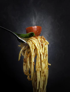a red pepper on a noodles
