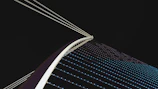 A dynamic bridge network symbolizing connection and speed under a clear sky