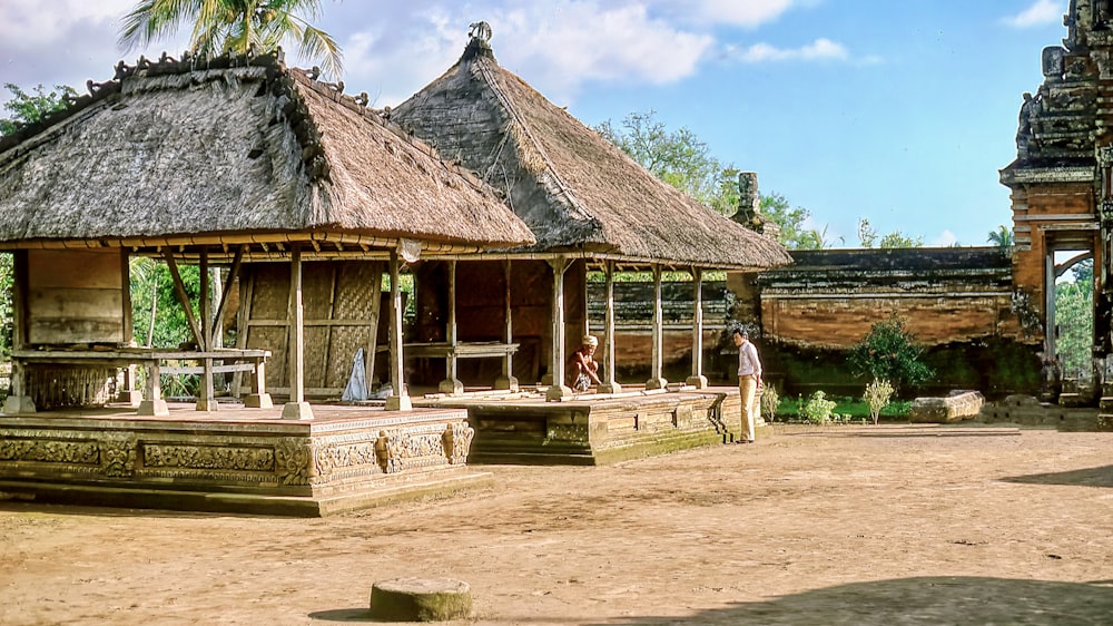 a building with a grass roof