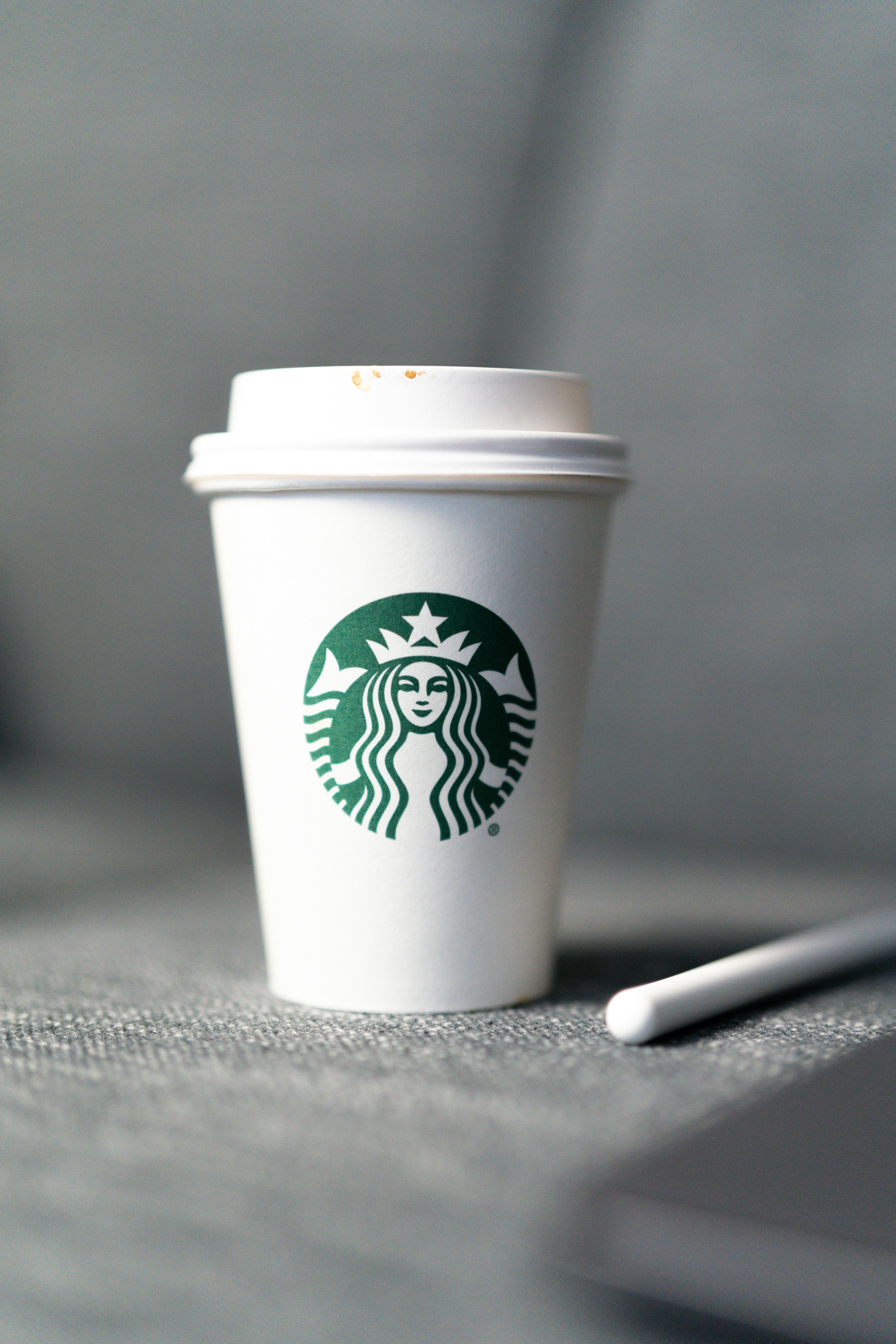 a coffee cup with a lid