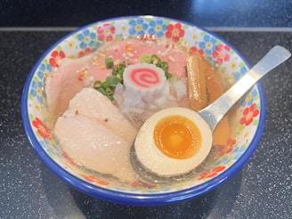 A vibrant bowl of ramen with soft noodles and aromatic curry.