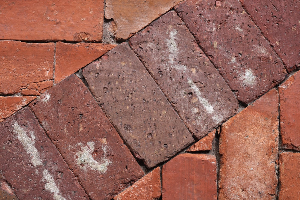 a brick wall with a hole in it