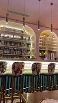 A stylish bar area with a variety of drinks.
