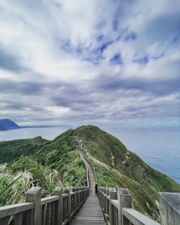 a wooden bridge over a body of water