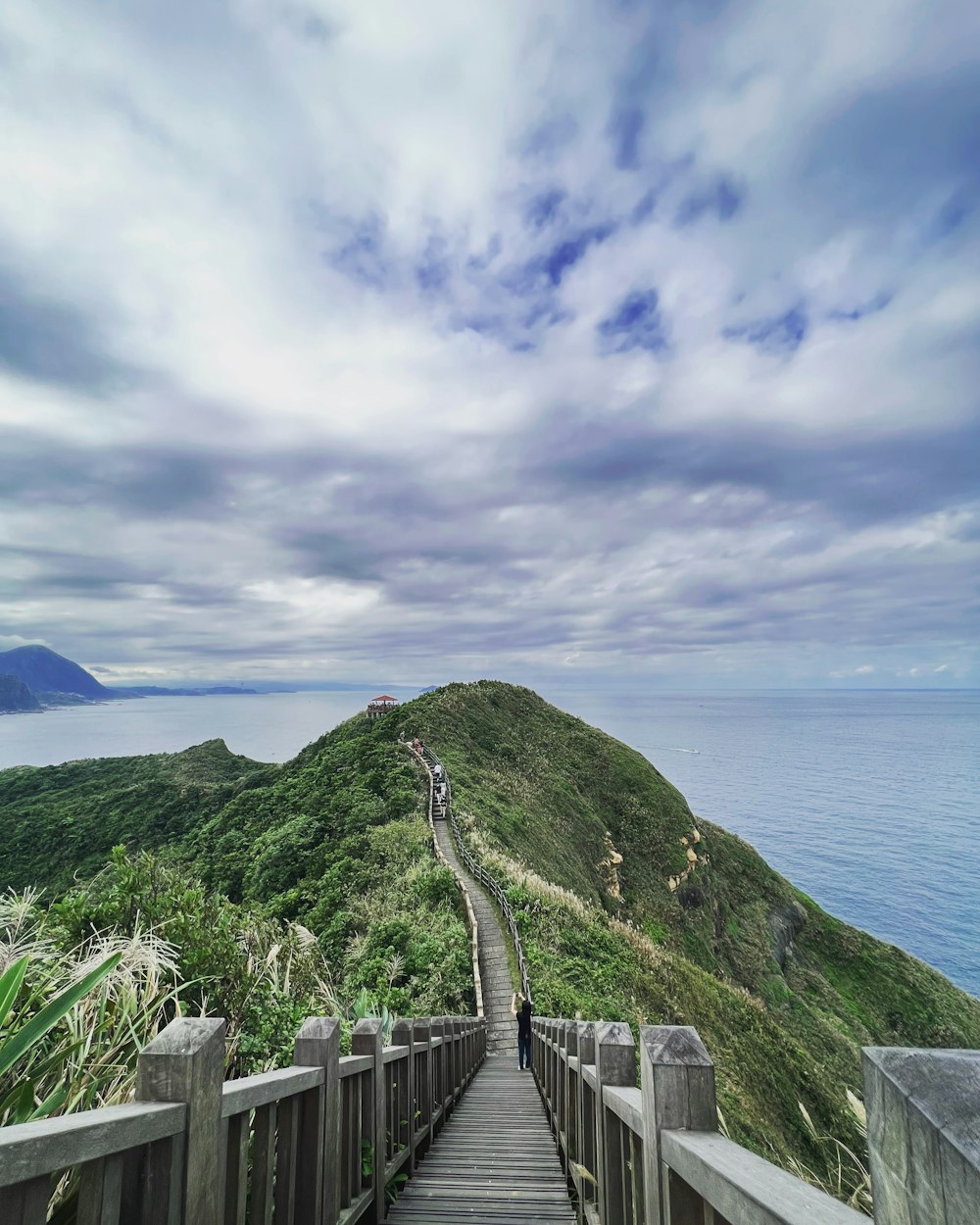 a wooden bridge over a body of water