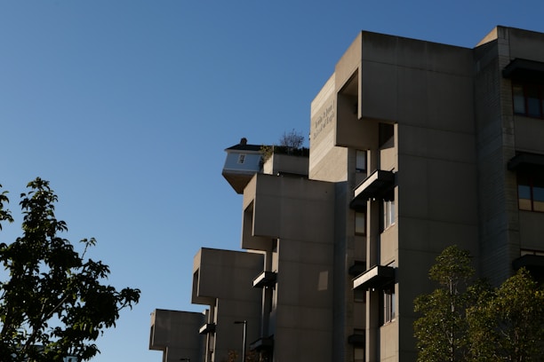 A stylish townhouse with unique architecture in an urban setting.