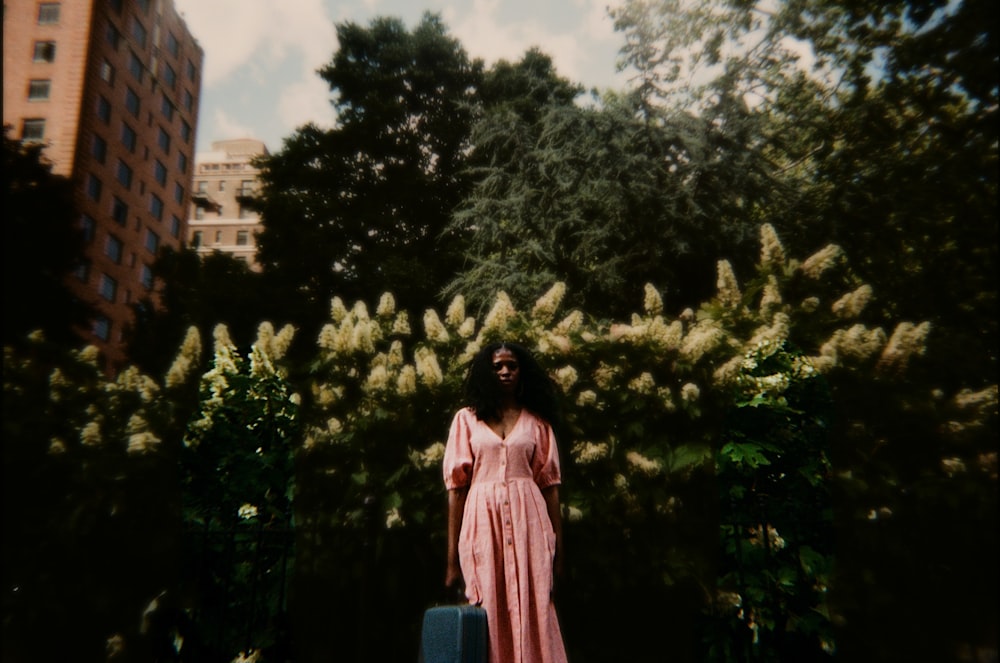 a person standing in front of a tree