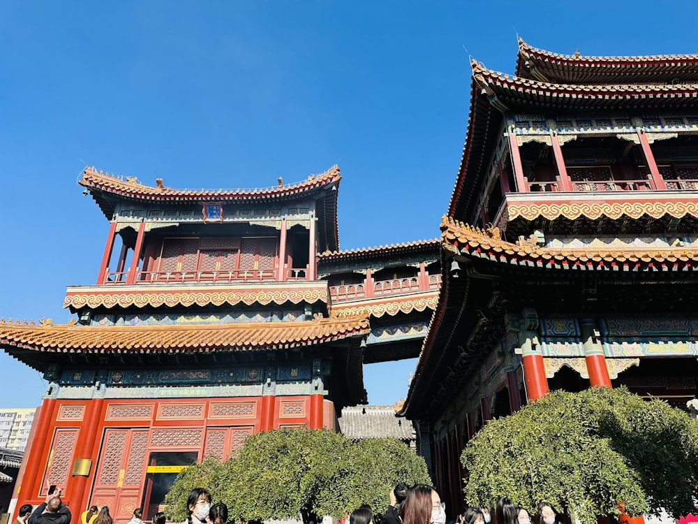 a building with red and yellow roofs