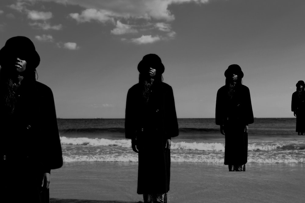 a group of people on a beach