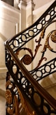 Close-up of architectural details highlighting the craftsmanship in a custom staircase railing.