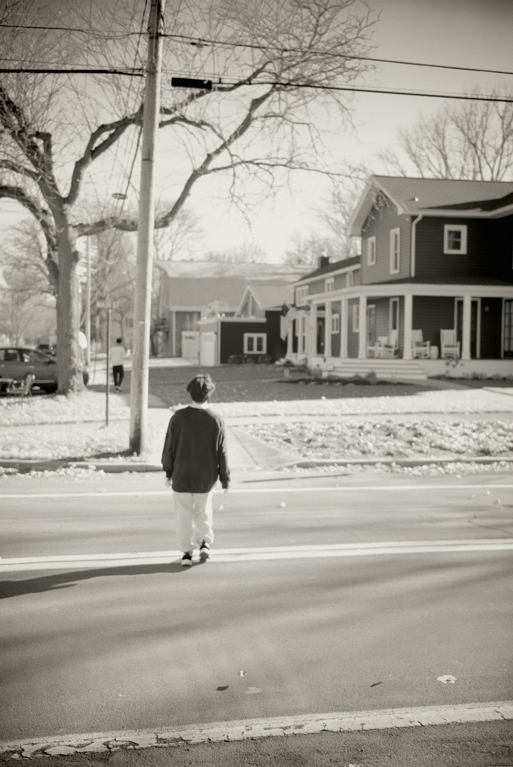 a person skateboards down a street