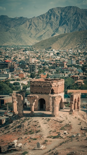 a city with a mountain in the background