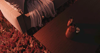 A plush, inviting sofa in a warm living room setting with soft lighting and cozy throws.