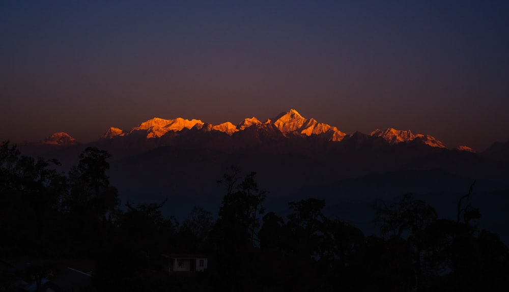 a mountain range at night