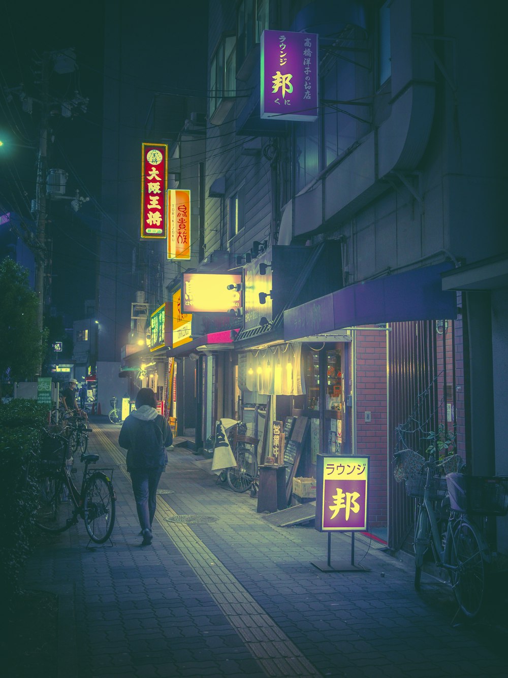 a person walking down a sidewalk