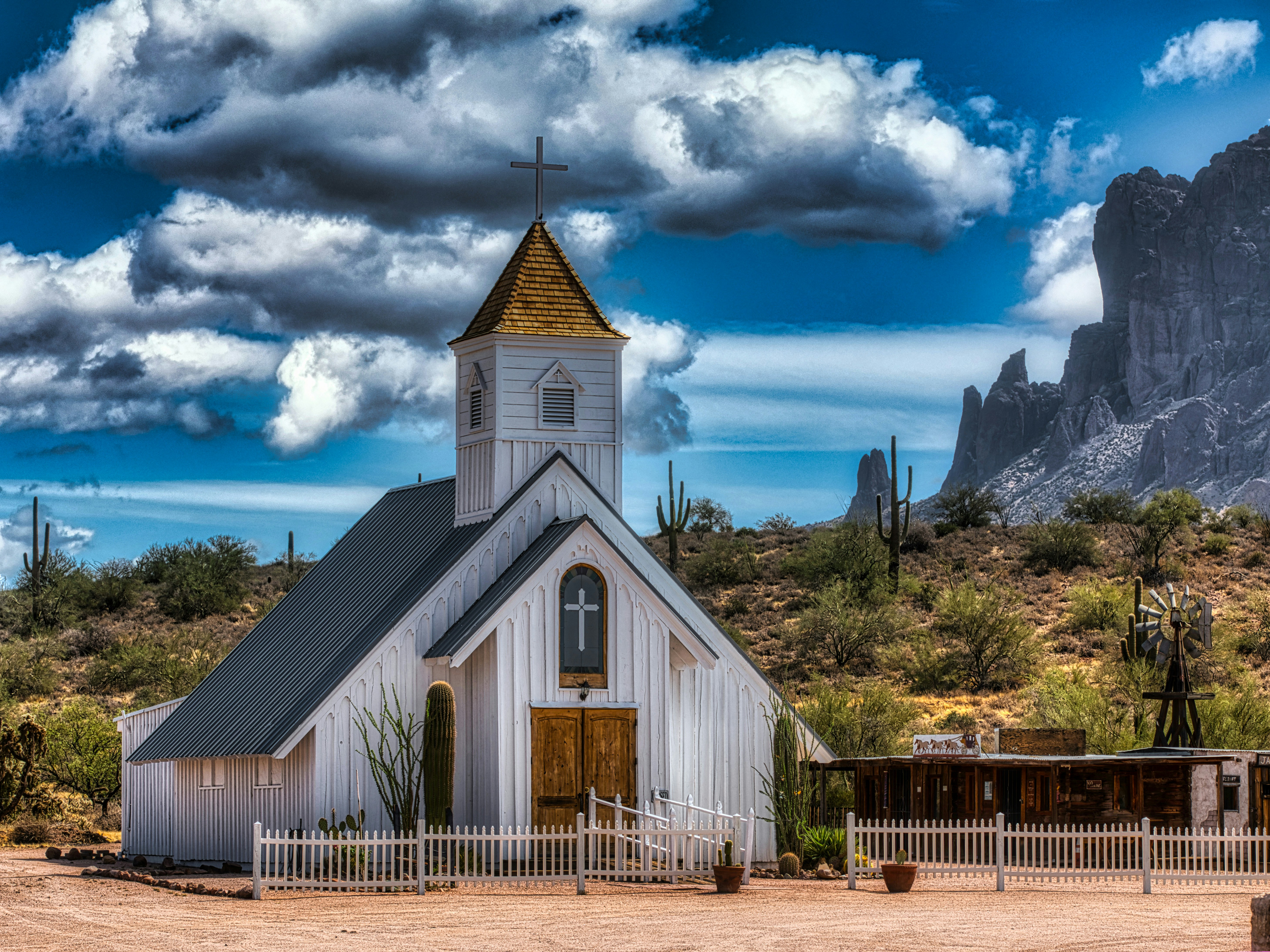 a white church with a cross on top