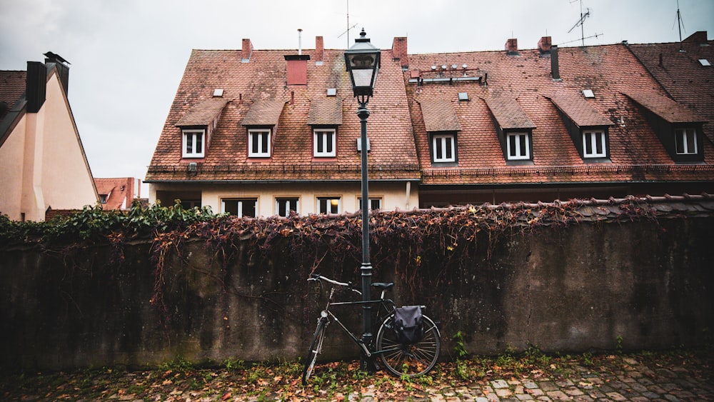 a bicycle parked on a wall