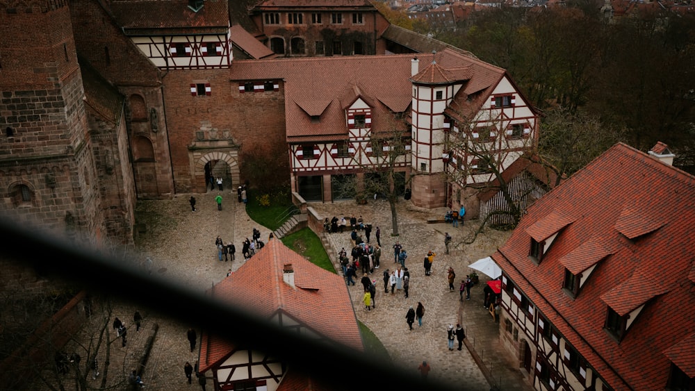 a courtyard with people walking around