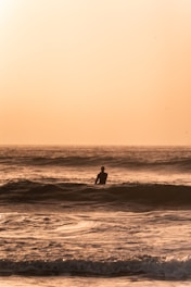 a person surfing in the sea