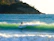 A surfer catching a perfect wave against a backdrop of lush green hills in Catanduanes.