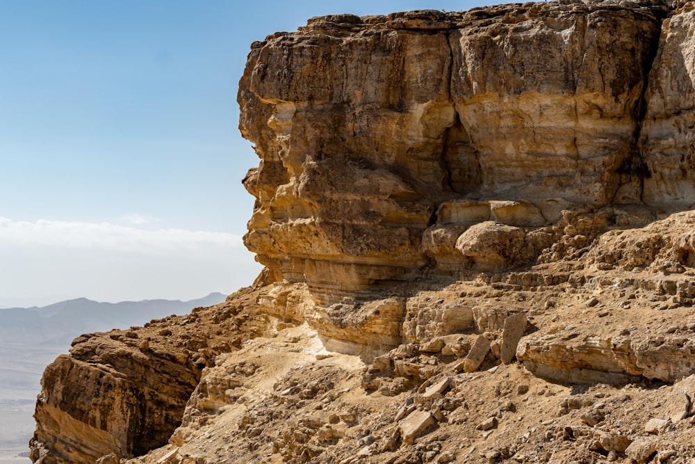 a large rock cliff