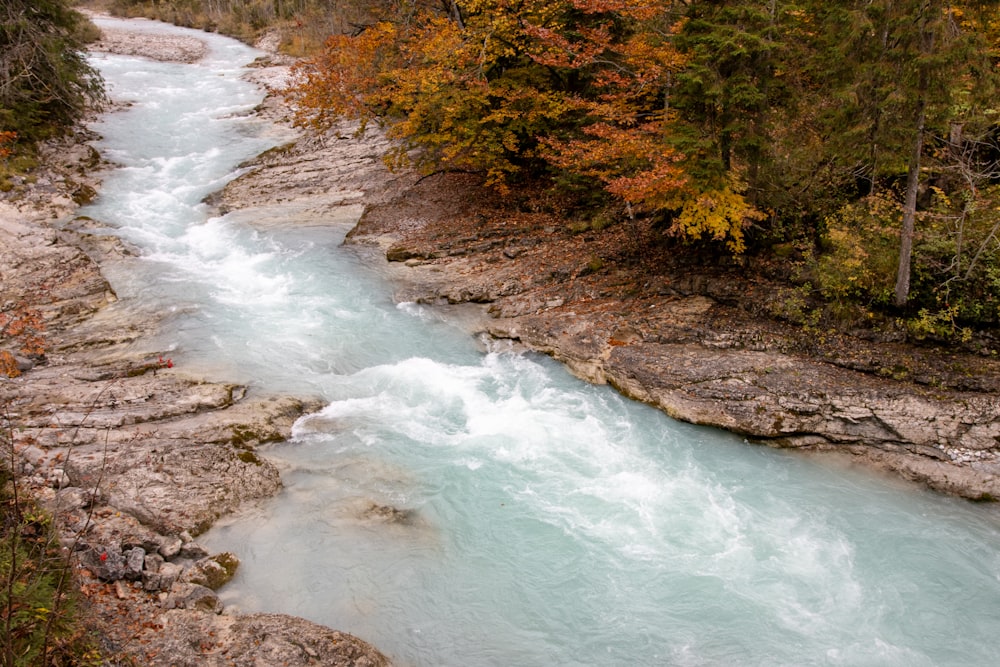 a river with a waterfall