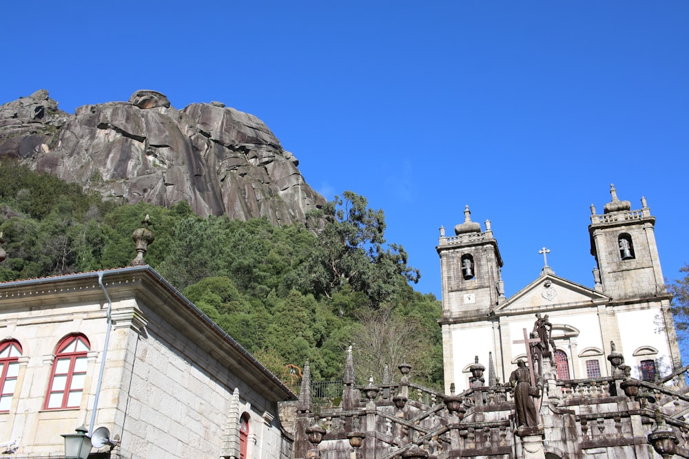 a building with a hill in the background