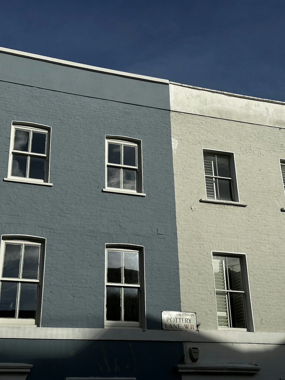 a grey building with windows