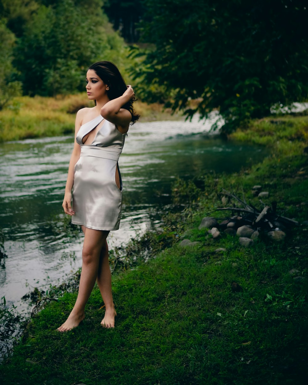 a woman standing in a stream