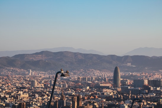 A panoramic view of Quito's skyline with the five company logos subtly integrated into the cityscape.