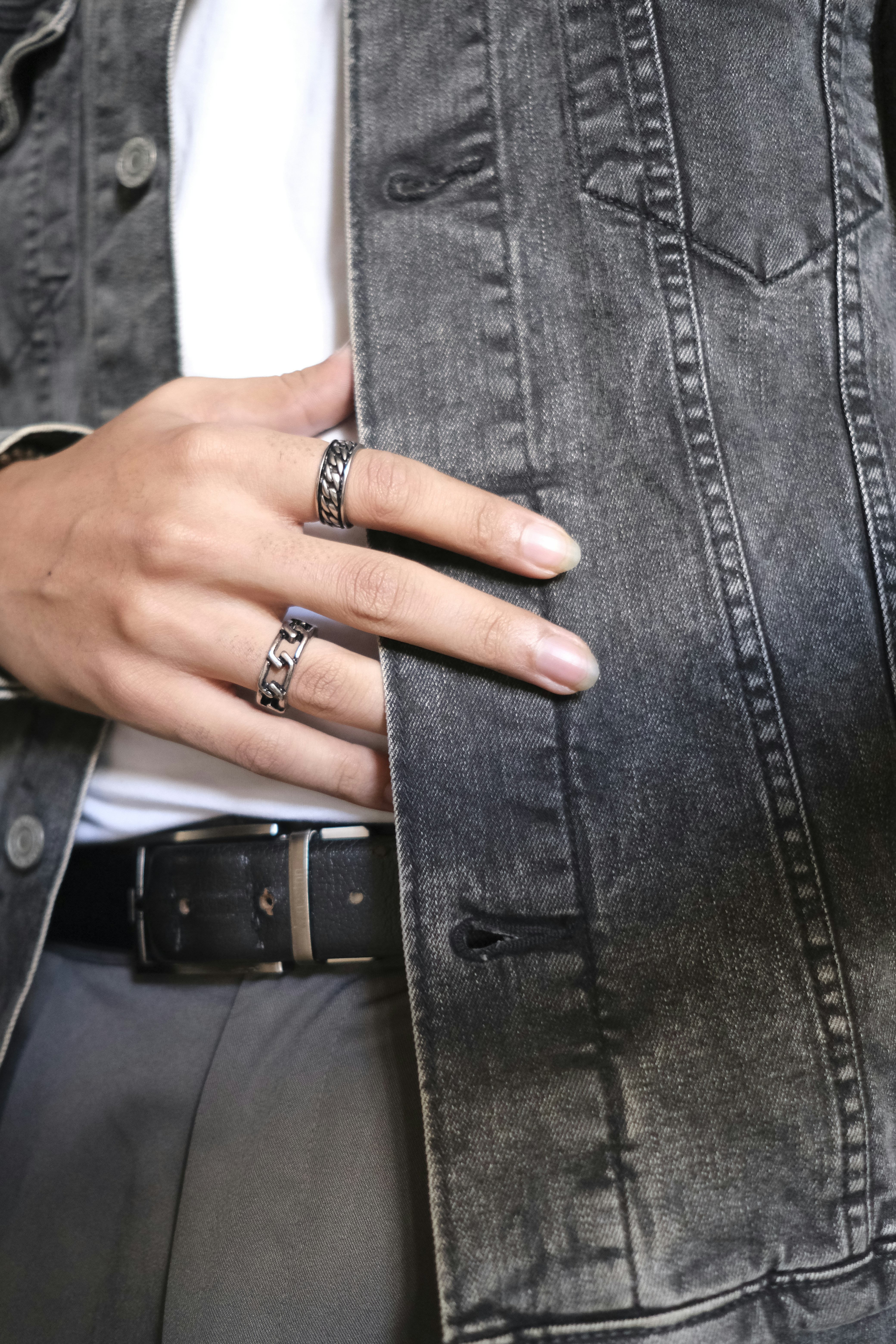 a person holding a belt