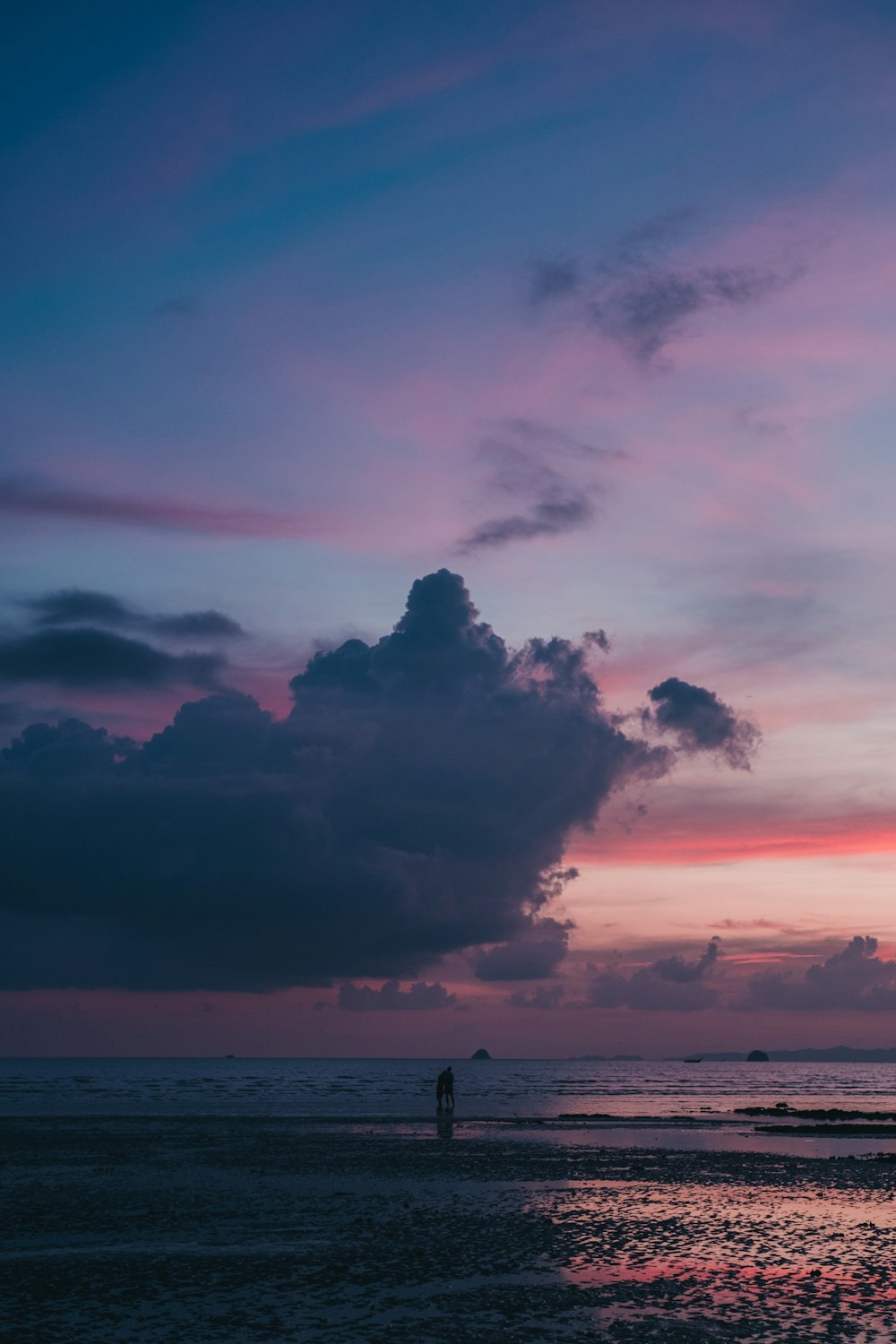 a person standing on a beach