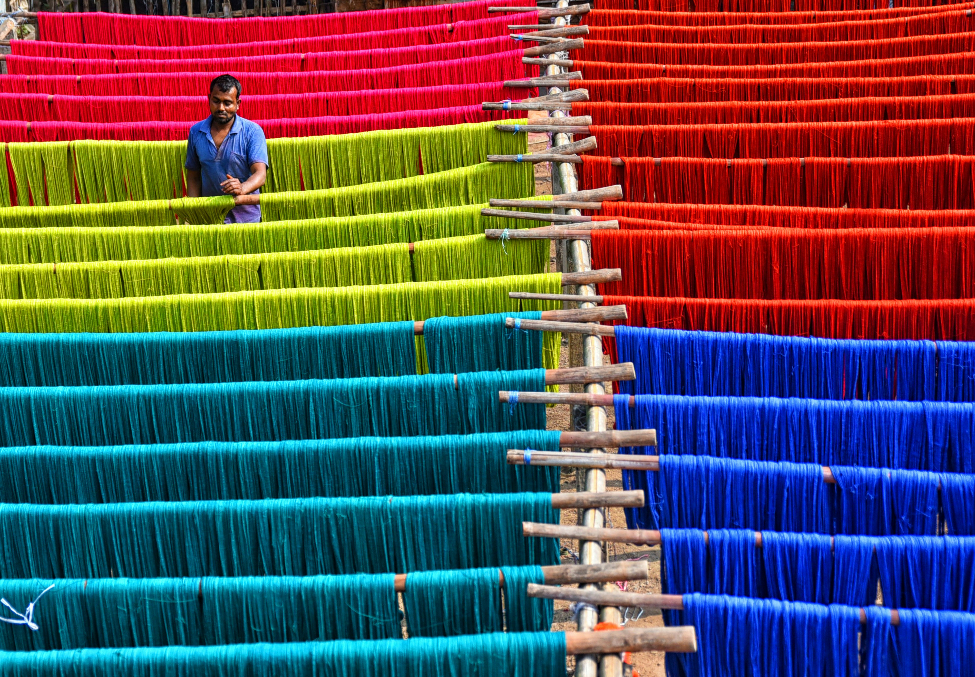 A collection of colorful Indian fabrics and textiles.