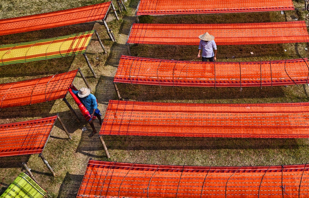 a few people working in a field