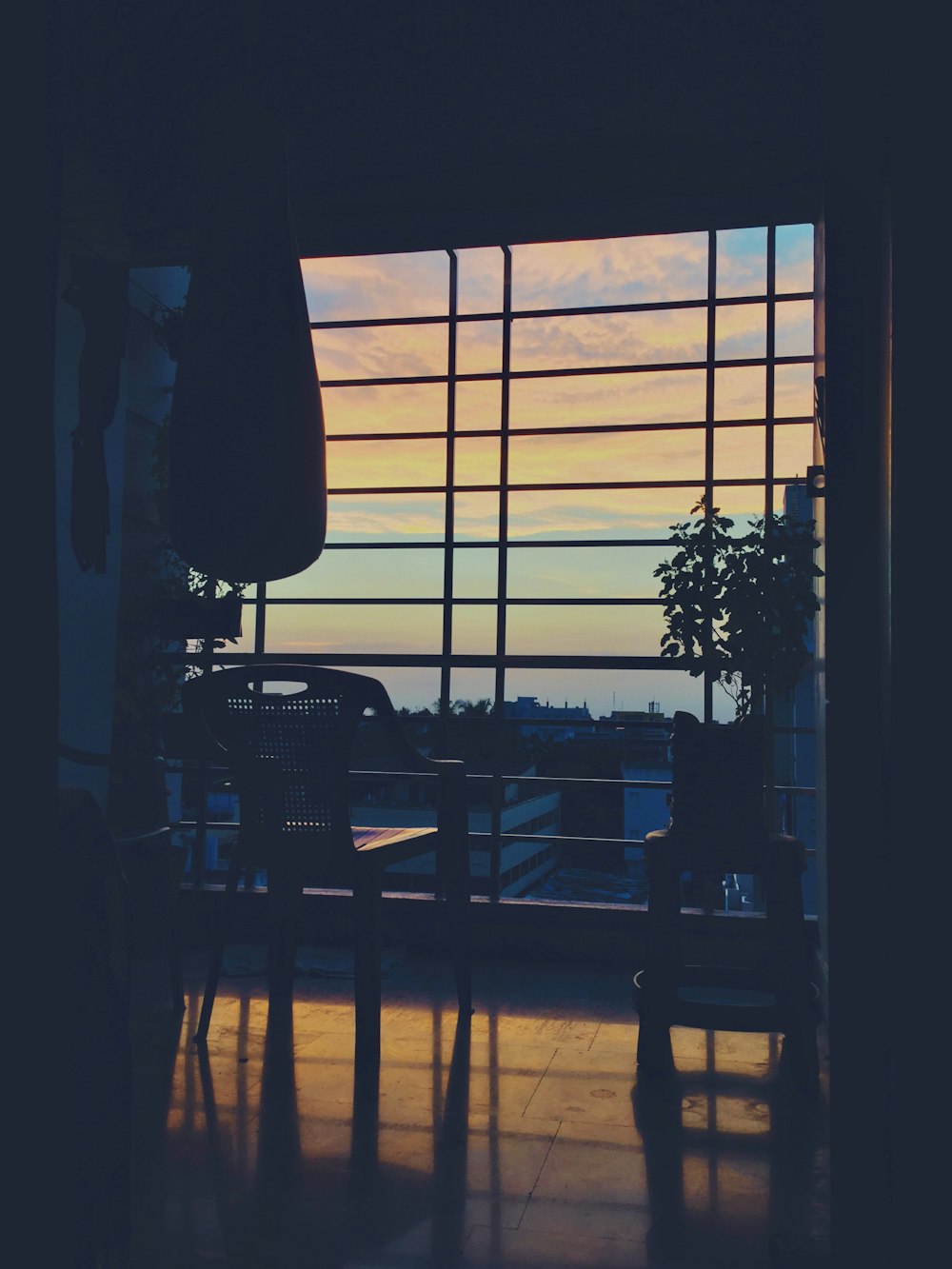 a view of the sunset through a window