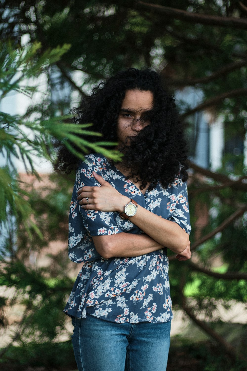 a person with long curly hair